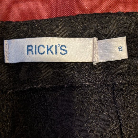 Black Ricki's Mini Skirt with Pockets - Picture 3 of 12